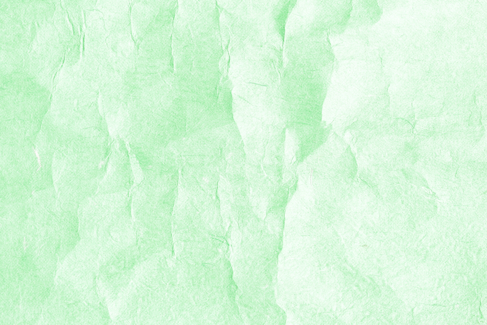 Light green crumpled paper texture